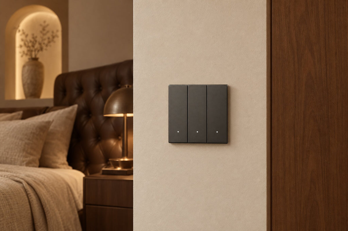 AG premium 3-gang smart switch on a terracotta bedroom wall