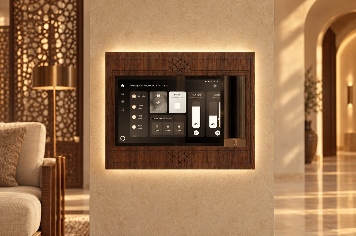 Smart control panel on a teal wall in a luxury Omani majlis